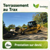Trax Caterpillar sur chenilles réalisant un terrassement en Île-de-France